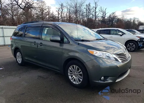 2014 Toyota Sienna Xle z USA, uszkodzony, nr VIN 5TDYK3DC4ES521844